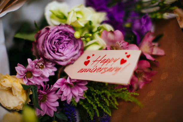 Bouquet of fresh pink roses and gift for Mother's Day