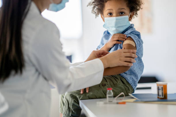 istock Boy Receiving a Vaccination During a Pandemic 1344413204