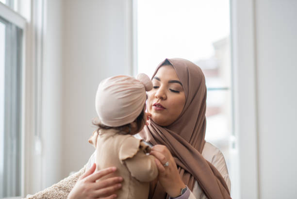 istock Muslim Mother and her Baby 1344413359