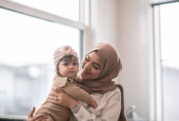 istock Muslim Mother and her Baby 1344413362