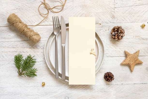 istock Festive table setting with fir tree branches. Mockup of Christmas or New Year menu card 1344413458