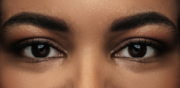istock Black woman face with a beautiful brown eyes 1344416088