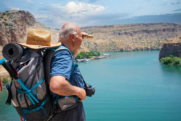 Senior Hiker on top of mountain