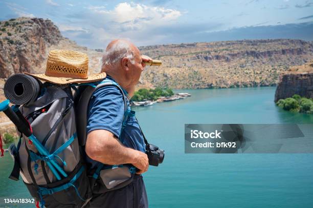 Senior Hiker On Top Of Mountain Stock Photo - Download Image Now - 65-69 Years, Active Lifestyle, Adult