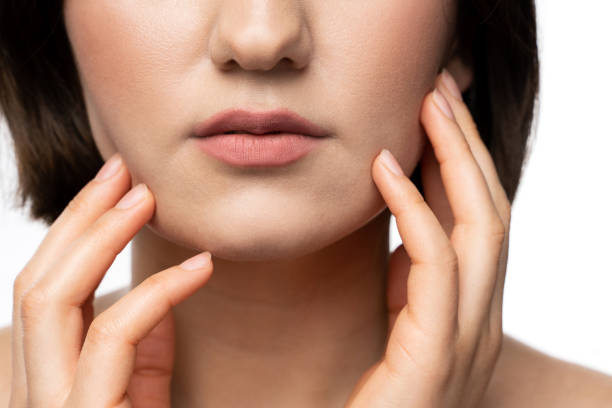 istock Closeup of female face with a natural lips 1344418537