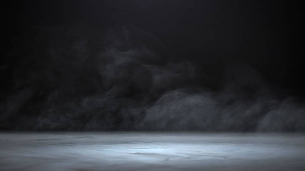 istock Gray textured concrete platform, podium or table with steam in the dark 1344418760