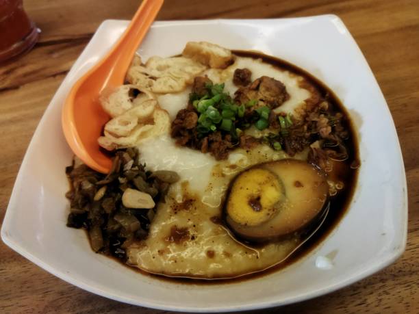 istock Chinese porridge with egg and some meats 1344419793