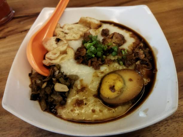 istock Chinese porridge with egg and some meats 1344419808