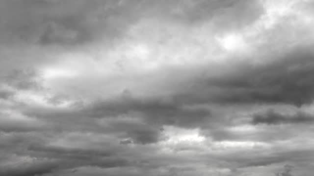 Building movements of black-white clouds. Fluffy white clouds sky time lapse. slowly moving clouds. B Coil Frames Slow Motion Cloudy Cloudscape. nature timelapse footage 4k.