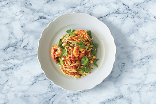 Seafood pasta on marble counter top