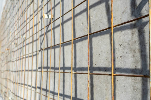 istock old metal grille with rust isolated on a natural wall background. 1344421160