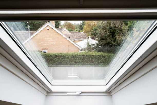 istock Abstract view of a newly installed skylight window in a loft conversion. 1344422309