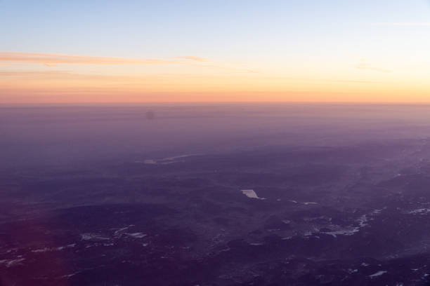 istock View to the sky and clouds on sunrise from airplane 1344422475