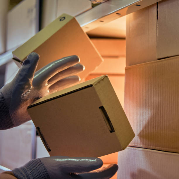 istock Falling and damage to packaging and goods in parcels in the warehouse. Problems with the safety of cargo during postal delivery 1344426850