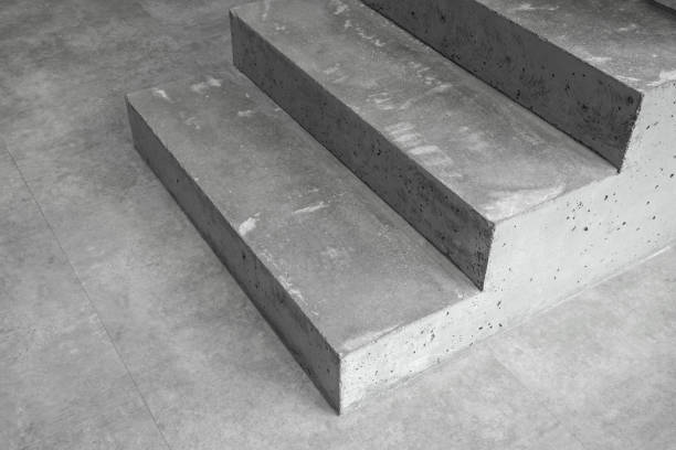 istock Grey concrete staircase in modern contemporary minimalistic interior 1344428909