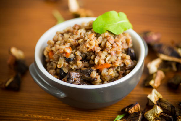 istock boiled buckwheat with vegetables and dried forest mushrooms in a ceramic mold 1344428932