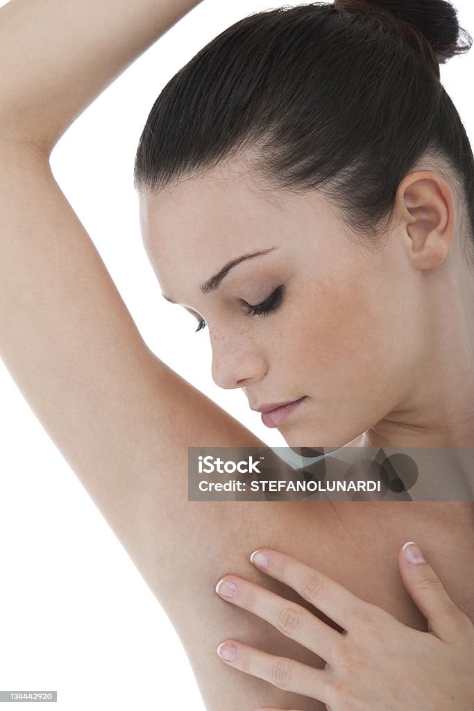 Armpit Young woman stroking her clean armpit 20-24 Years Stock Photo