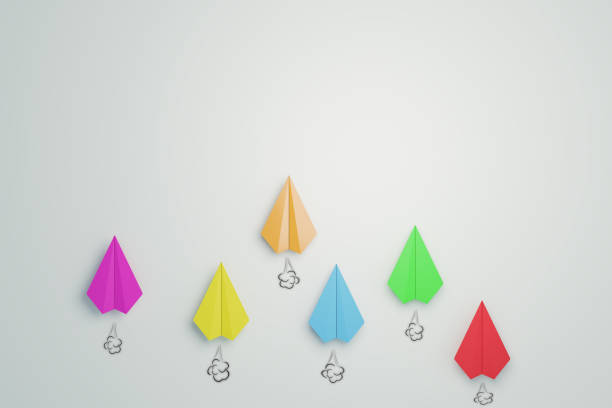 Crumpled paper balls on orange background