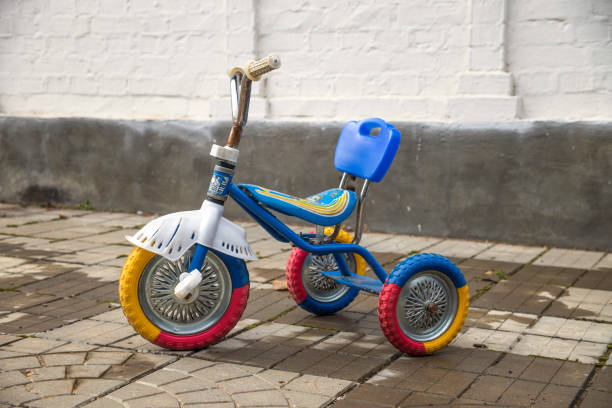 Old Red Kids Bike on The Grass