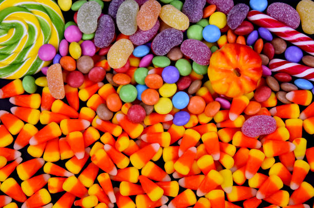 istock Mixed halloween candy background close-up top view stock images 1344435015