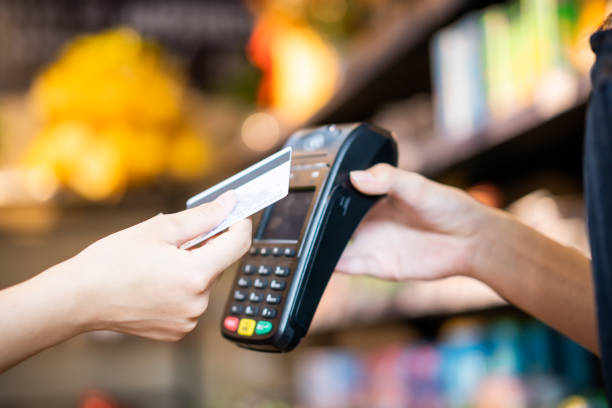istock Make contactless payments with a credit card at the store 1344435562