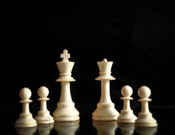 istock White Chess King, Queen and Pawns 1344439392