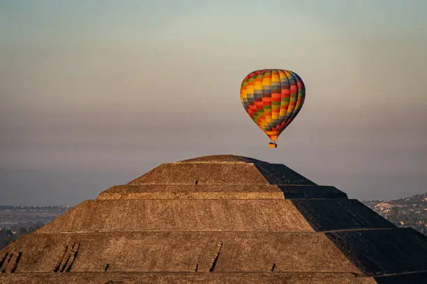 Hot air balloon over the pyramids of Teotihuacan in Mexico