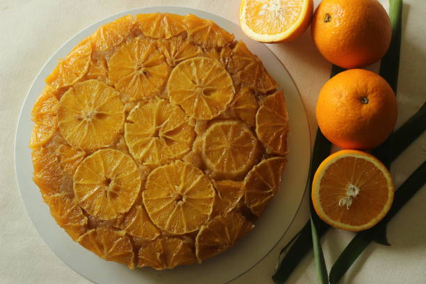istock Home baked Orange upside down cake with orange slices on the top 1344441674