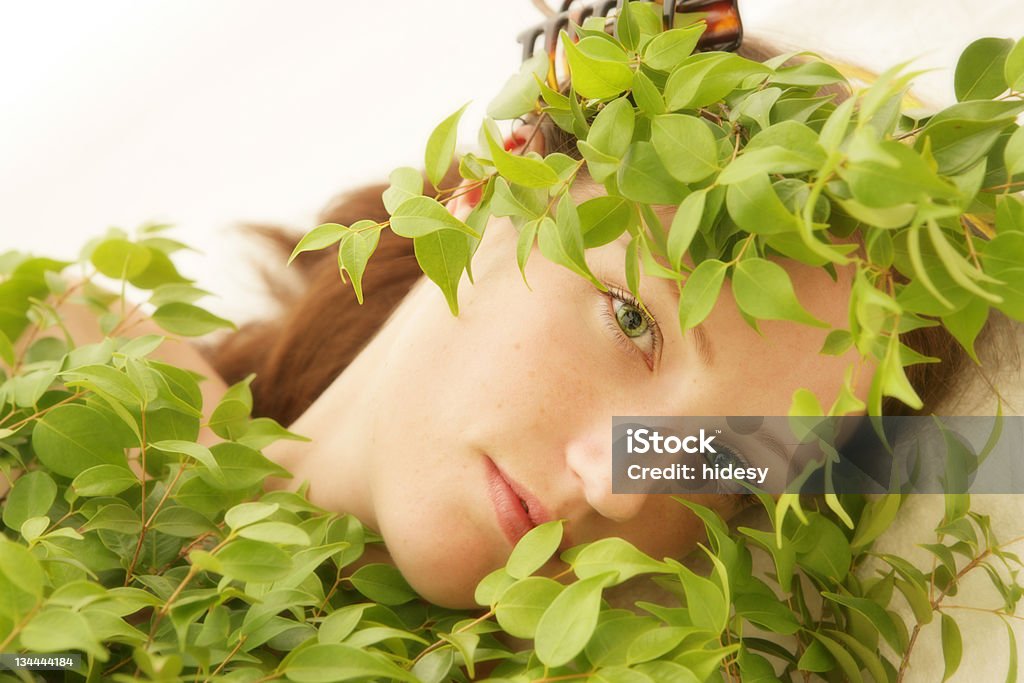 Green Secrets Woman in leaves Adult Stock Photo