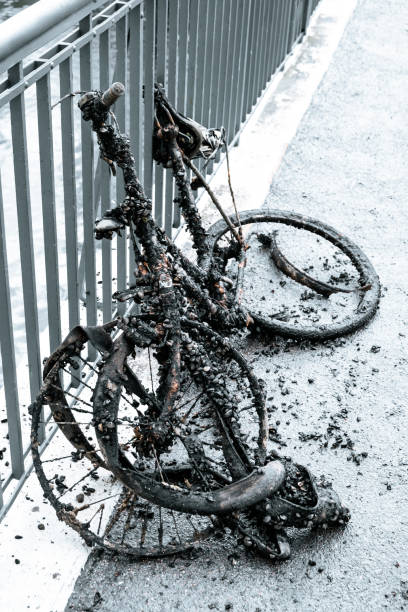 istock old destroyed bicycle out of. water lying on bridge 1344447519