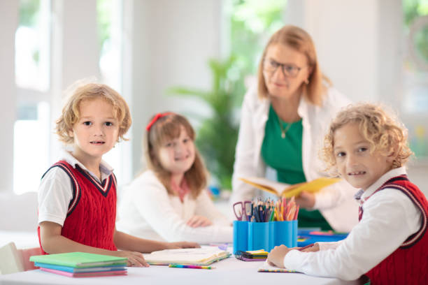 istock Kids in school. Children in class. 1344448922