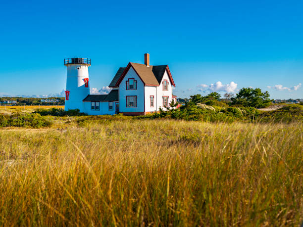 istock Autumn landscape at the Stage Harbor Lighthouse in Chatham 1344450173