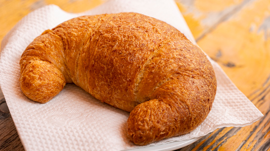 Croissants for breakfast. Wholemeal brioche. Traditional French and Italian breakfast. Bakery products.