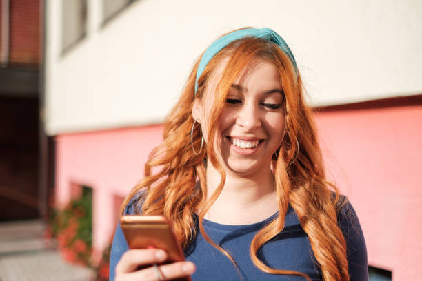 istock young red hair smiling girl 1344451579