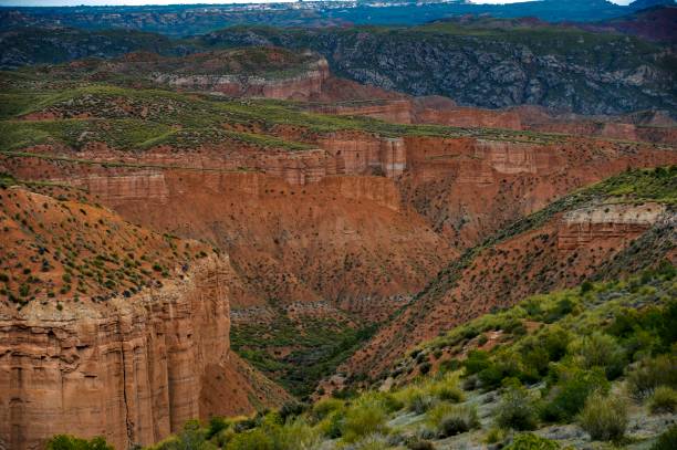 istock Empty desert landscape with open plateau and band of cliffs. 1344452327