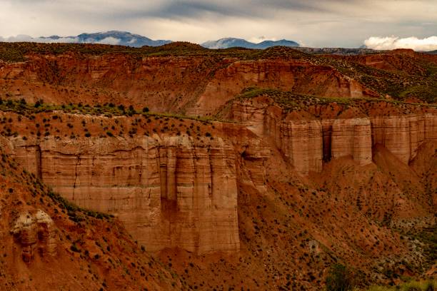 istock Empty desert landscape with open plateau and band of cliffs. 1344452349