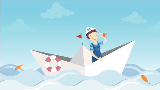 Vector illustration of a boy imagines he is a pirate and he travels in a paper boat. You can contact me if you have any questions or want anything.
