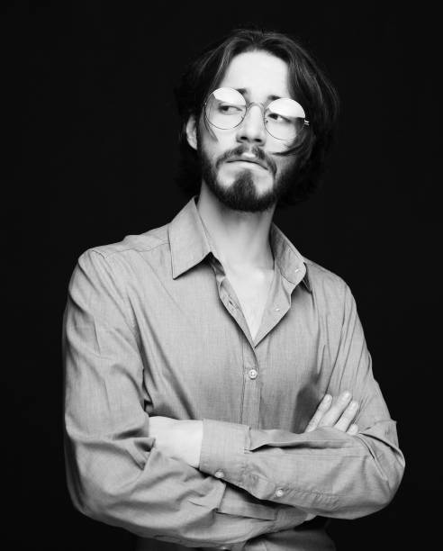 istock Good looking man in glasses, portrait, black and white 1344456745