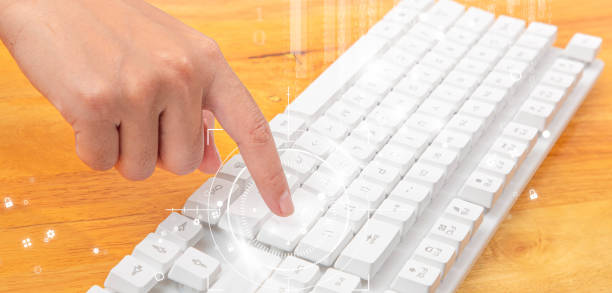 istock Female office worker typing on the keyboard 1344456883