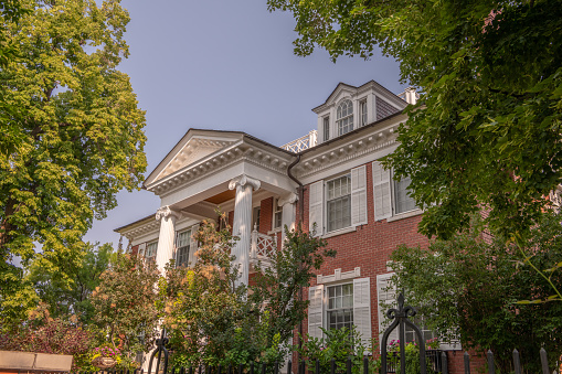Denver, CO - August 30, 2021: A beautiful old home with traditional architecture in the Capitol Hill neighborhood, near Cheesman park downtown.