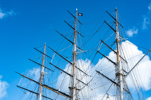 Old ship mast and sail ropes closeup