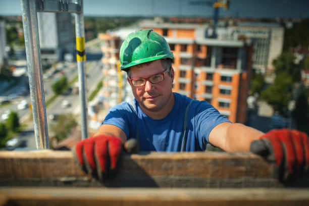 istock Construction worker on top of a building. 1344461882