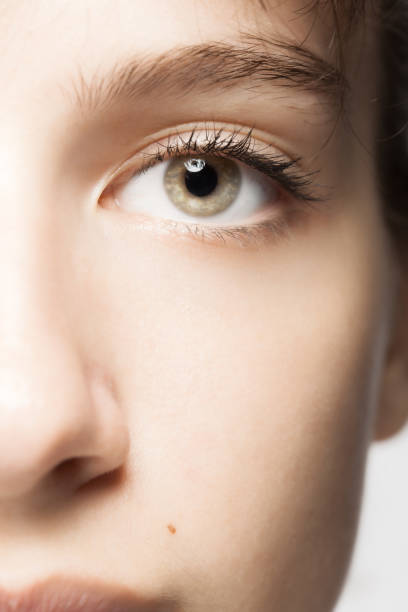 istock Beautiful young girl studio portrait. Abstract eyes looking at camera. 1344463853