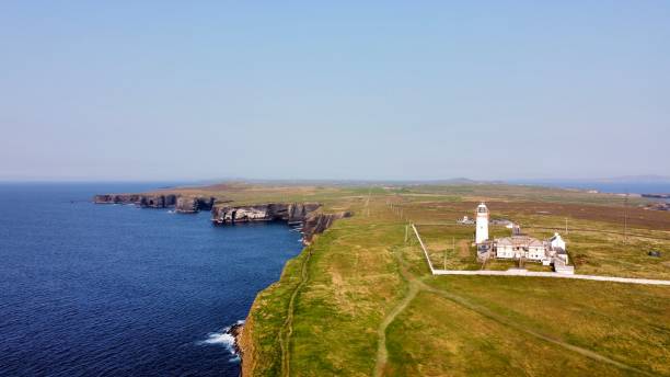 istock Lighthouse of the Head loop peninsula view, Ireland 1344464546