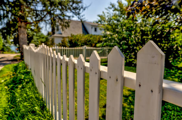 istock White picket fence in a small town in Ontario 1344464604