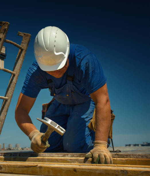 istock Construction worker on top of a building. 1344464972