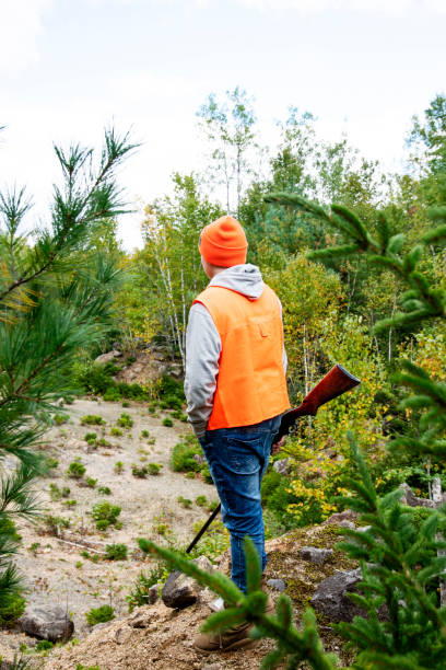 istock A young hunter in the woods bird hunting 1344469306