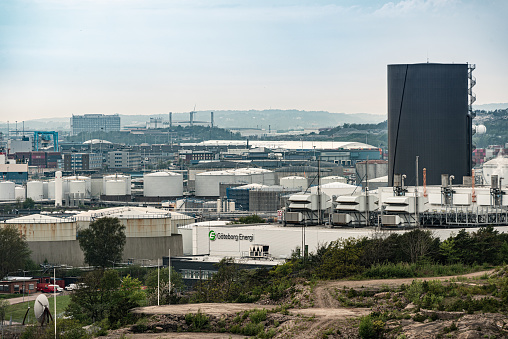Gothenburg, Sweden - May 14 2021: Industrial facilities and ships docked at Skandiahamnen.