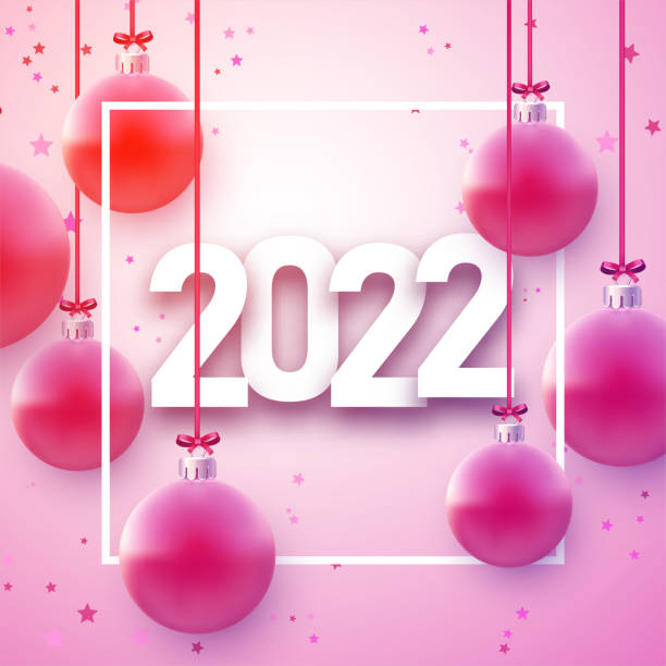 istock 2022 sign with hanging beautiful Christmas baubles. 1344474318