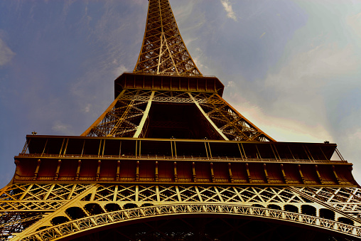 The Eiffel Tower is a wrought-iron lattice on the Cham de Mars in Paris.